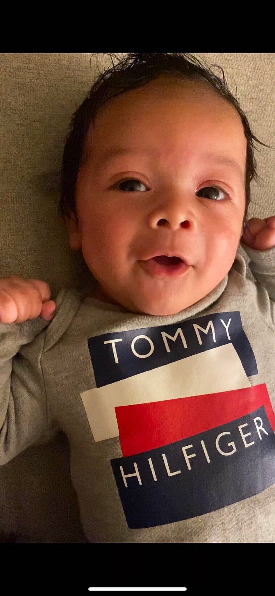 Jayvion is registered to the contest to win money with this photo: baby, baby_toddler_clothing, cheek, chin, eyebrow, facial_expression, finger, forehead, gesture, happy, head, human, lip, mouth, neck, nose, person, skin, sleeve, smile