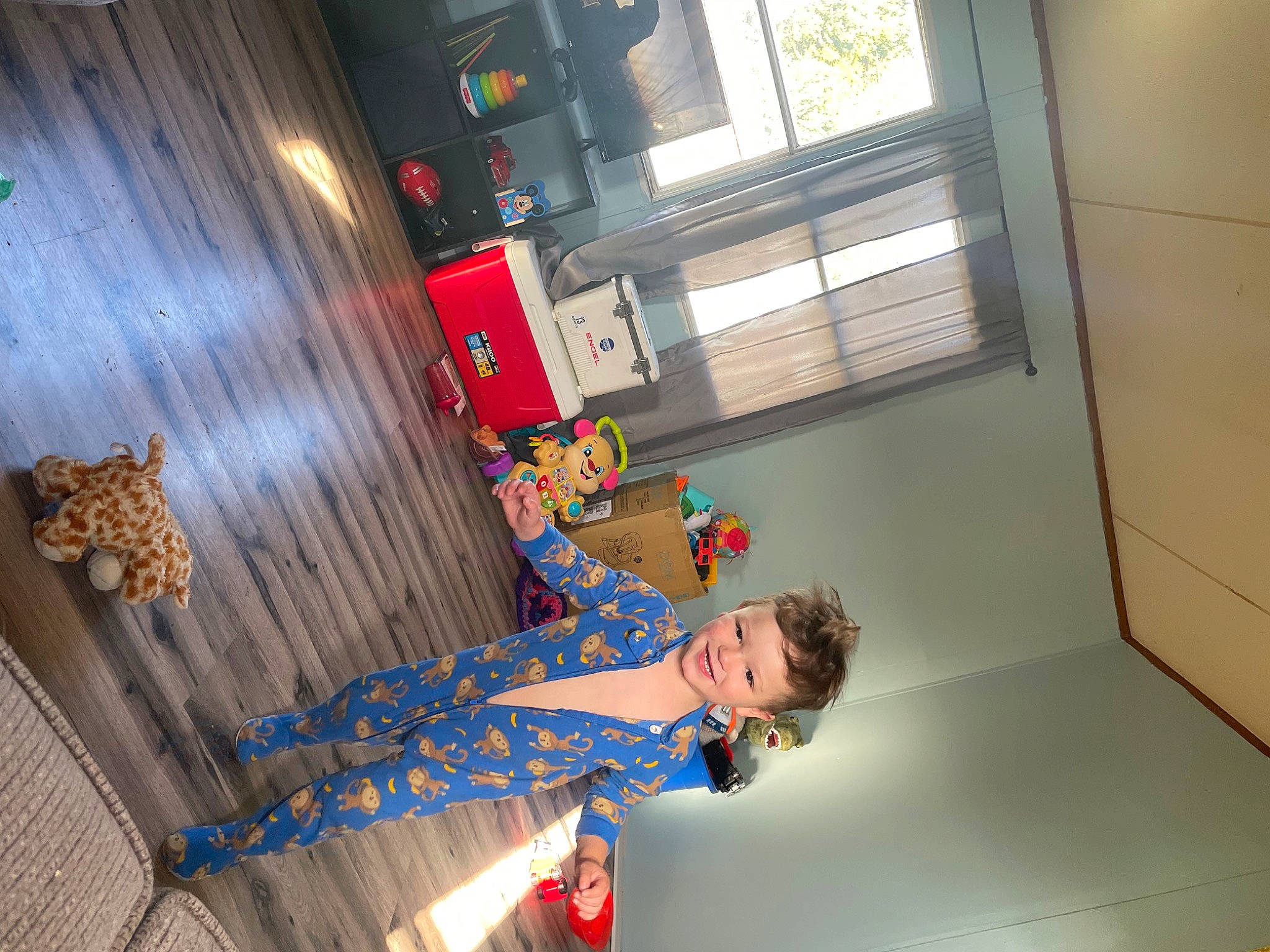 Trey is registered to the contest to win money with this photo: building, ceiling, child, curtain, daylighting, dress, event, flooring, fun, hardwood, house, joy, leisure, person, room, stairs, tree, window, window_blind, wood