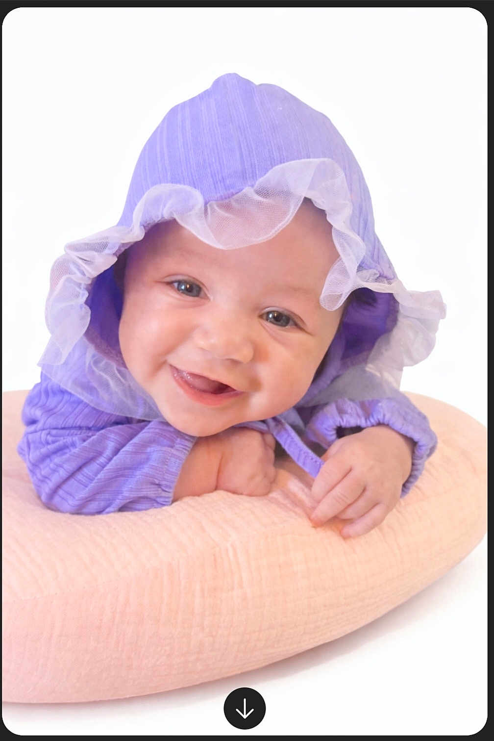 Iris joined the competition — help win amazing prizes! baby, purple_bonnet, smiling, happy, pillow, soft, cute, infant, child, face, portrait, clothing, headwear, hands, skin, closeup, lying_down, innocent, adorable, studio