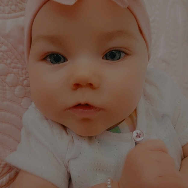 Melody is registered to the contest to win money with this photo: baby, baby_toddler_clothing, cheek, dress, eye, eyebrow, eyelash, flash_photography, happy, head, headgear, headpiece, human_body, iris, lip, nose, pink, skin, sleeve, toddler