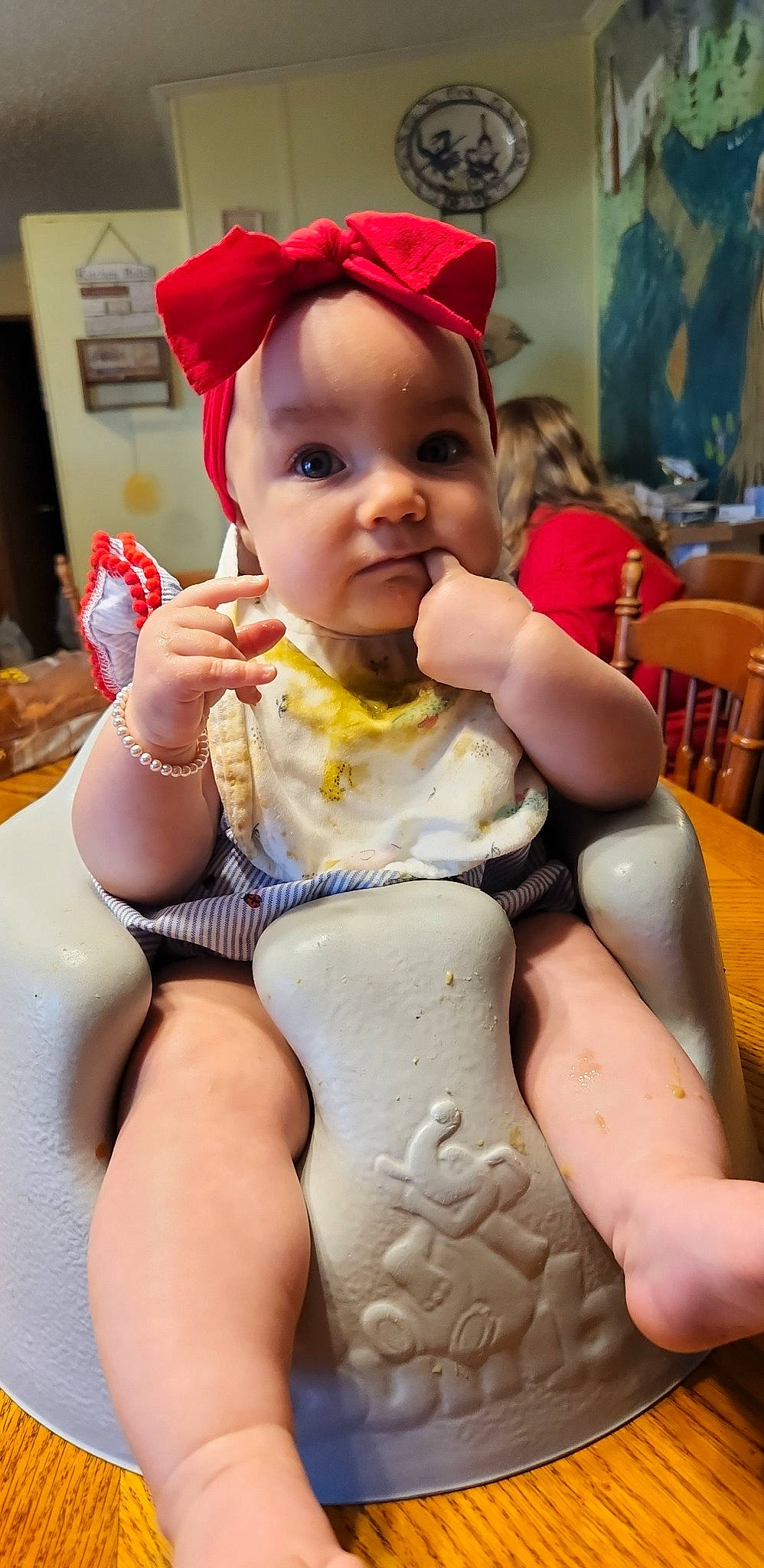 Melody is registered to the contest to win money with this photo: abdomen, baby, baby_toddler_clothing, chair, cheek, chest, child, event, fun, happy, hat, human_leg, lip, mouth, person, sitting, skin, thigh, thumb, toddler