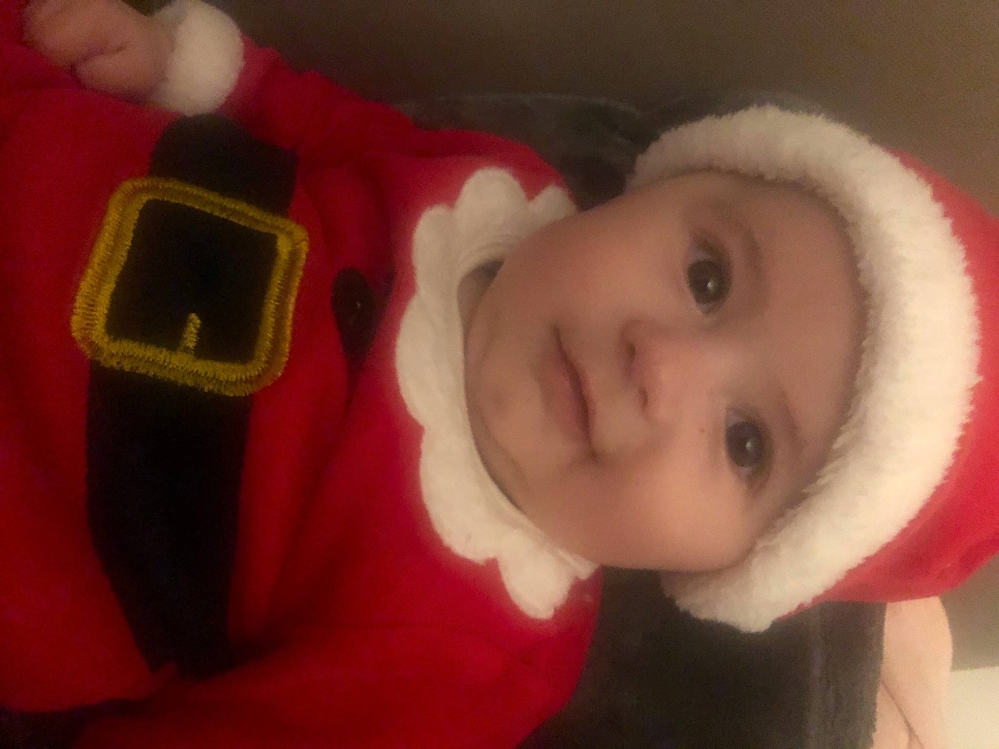 Wyatt participe au concours pour gagner de l'argent avec cette photo : baby, cheek, child, christmas, ear, eye, fictional_character, head, headwear, lip, mouth, nose, person, red, skin, smile, toddler
