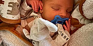 Waylon joined the competition — help win amazing prizes! newborn, baby, sleeping, blanket, pacifier, plush_toy, elephant, cozy, soft, infant, cute, rest, child, comfort, warm, clothing, bed, portrait, peaceful, hand