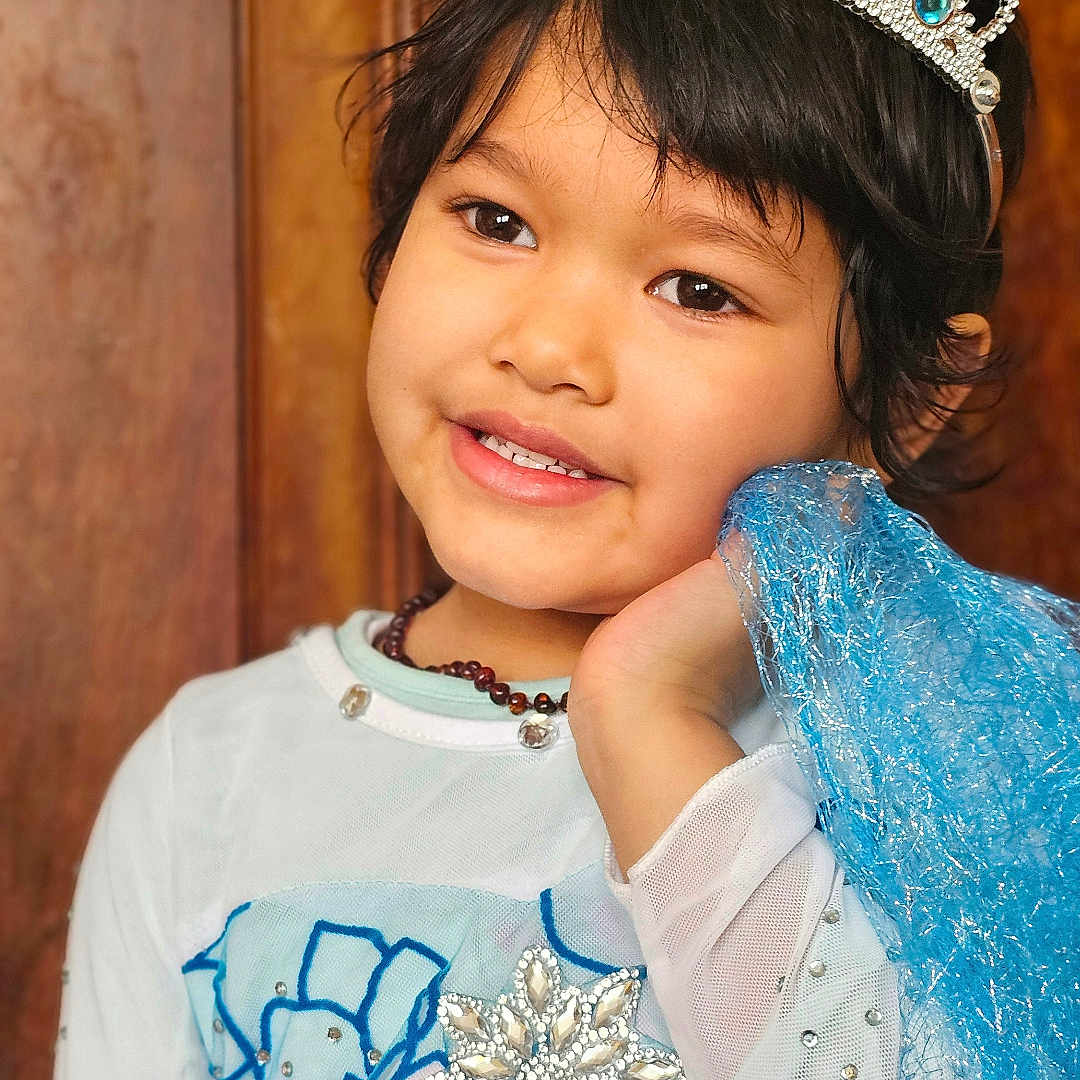 Shanaya Summer is registered to the contest to win money with this photo: accessories, child, clothing, crown, diamond, dress, face, female, gemstone, girl, happy, head, jewelry, necklace, person, photography, portrait, smile, tiara, turquoise
