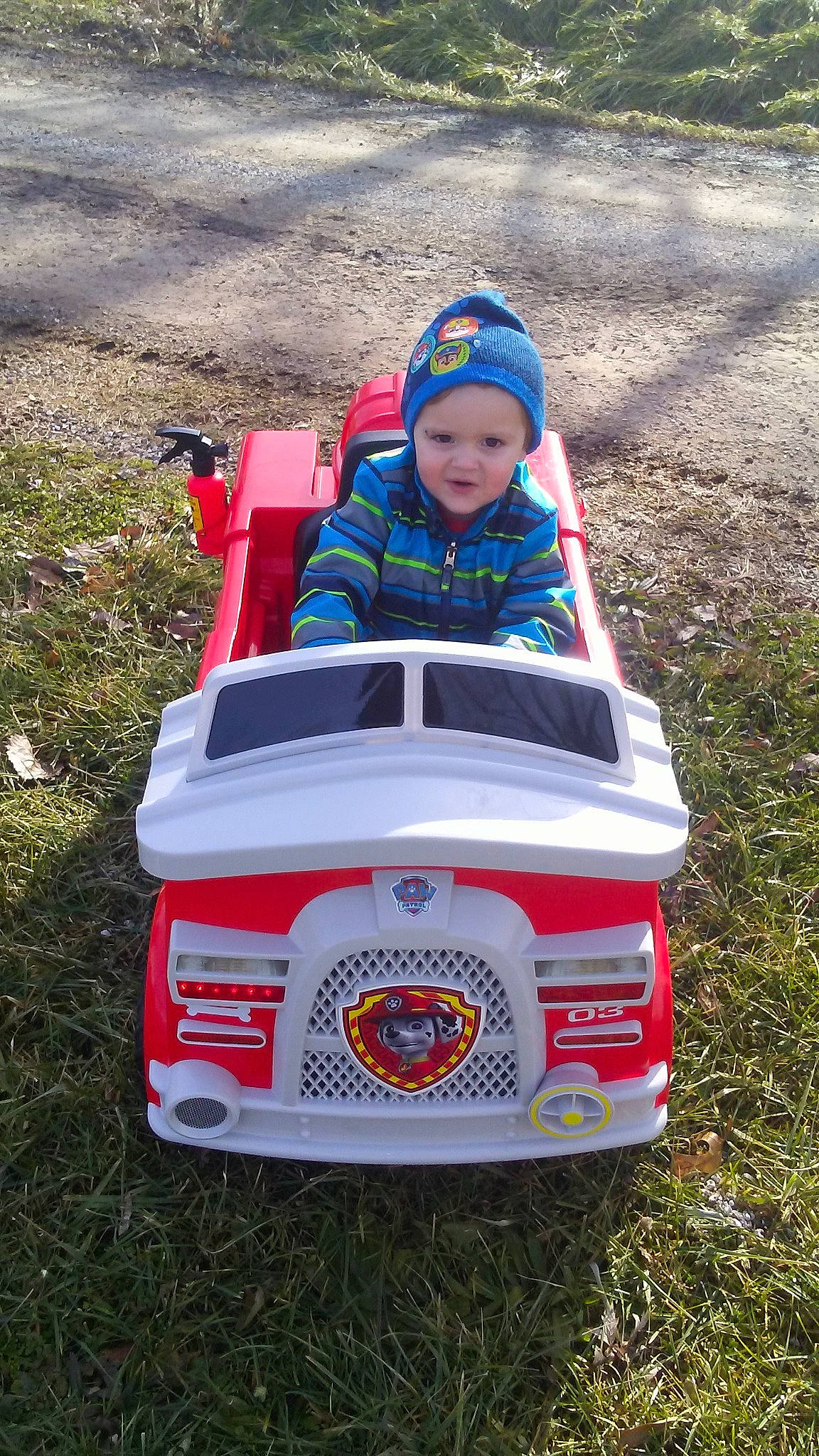 Drayden joined the competition — help win amazing prizes! automotive_exterior, car, city_car, compact_car, fun, grass, motor_vehicle, person, product, vacation, vehicle