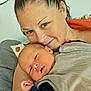 Gabin participe au concours pour gagner de l'argent avec cette photo : woman, baby, newborn, couch, blanket, smile, face, arm, indoor, love, family, skin, hair, comfort, person, holding, clothing, pillow, home, relaxation