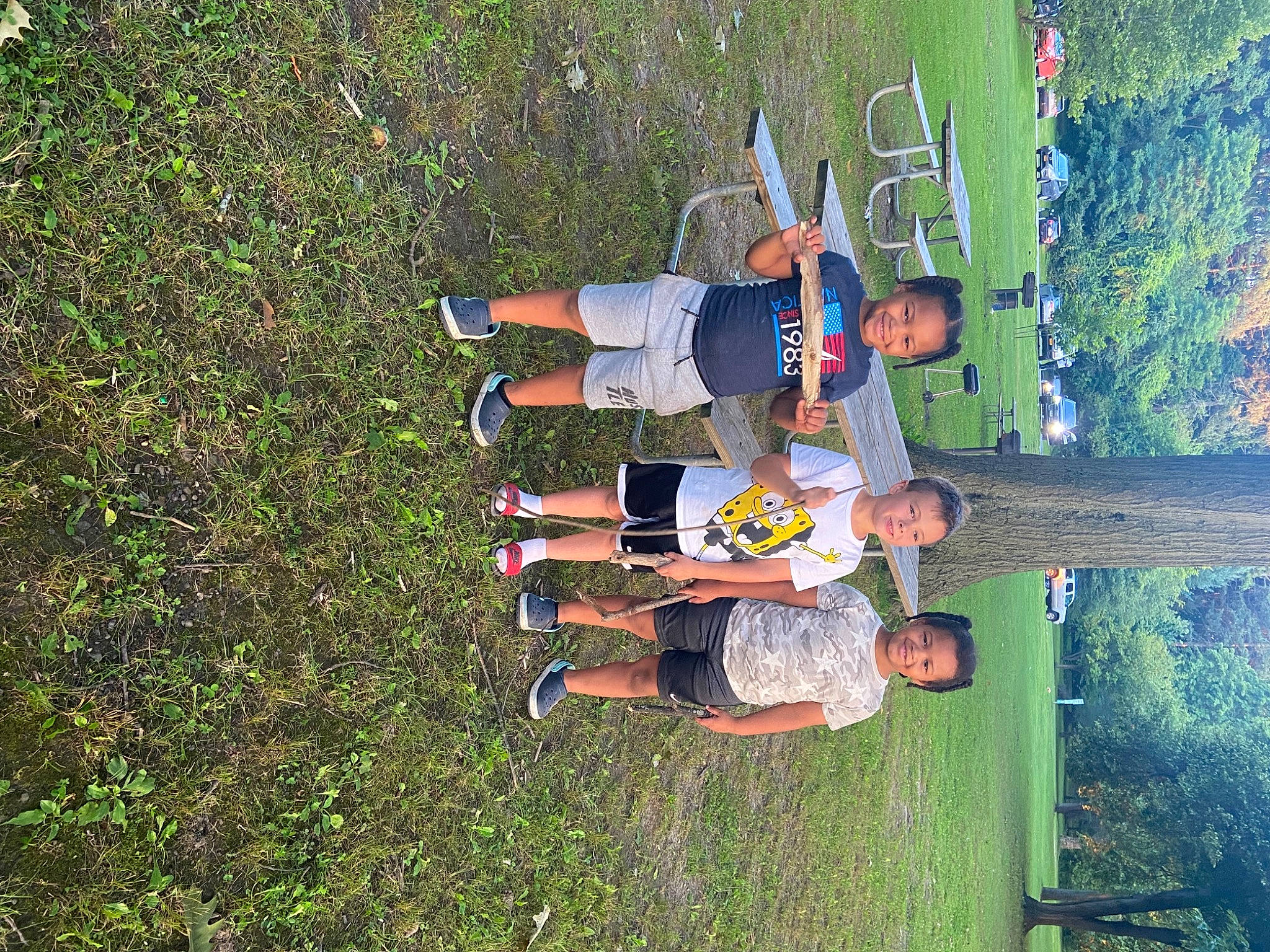 Rondell And Rockell is registered to the contest to win money with this photo: adventure, child, fun, grass, grassland, happy, joy, landscape, leisure, people_in_nature, person, plant, play, recreation, shadow, shorts, soil, t_shirt, toddler, tree