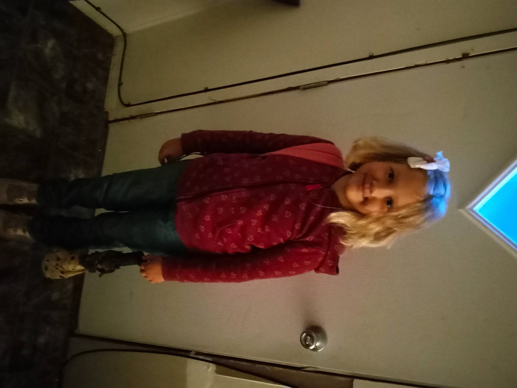 Annabella is registered to the contest to win money with this photo: ceiling, child, elbow, flooring, fun, human_leg, joy, knee, magenta, person, room, sitting, thigh, tints_and_shades, vehicle_door, wrist