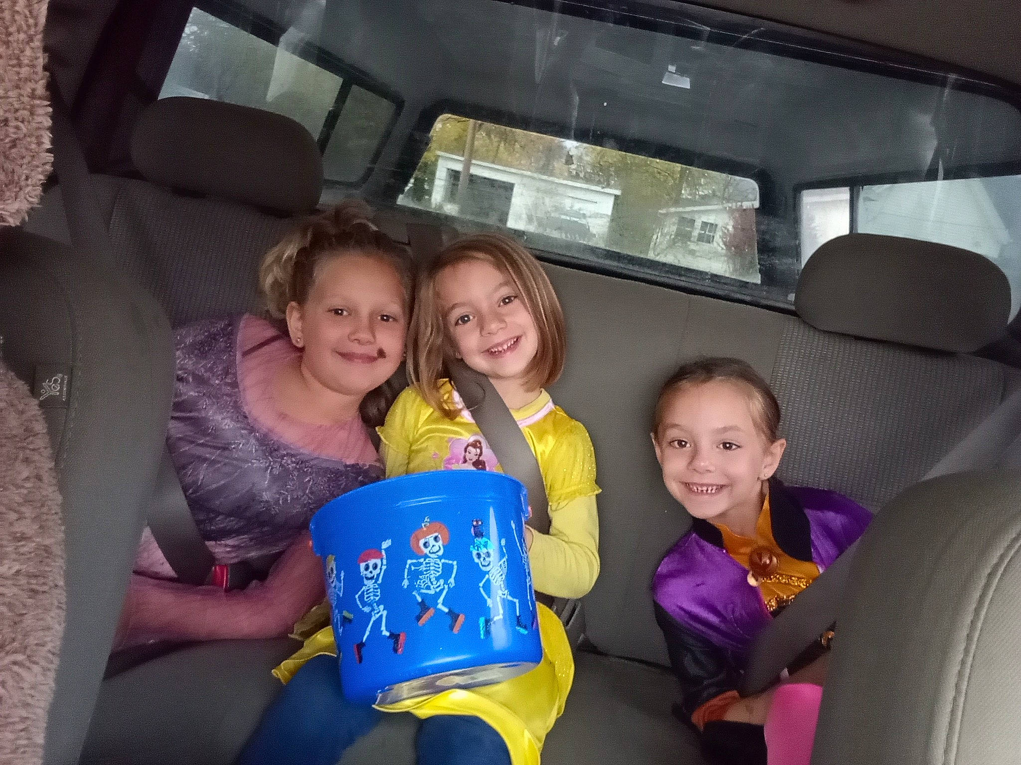 Nicole is registered to the contest to win money with this photo: auto_part, automotive_design, automotive_exterior, car, car_seat, car_seat_cover, child, face, fun, happy, head_restraint, joy, leisure, motor_vehicle, person, seat_belt, smile, steering_wheel, toddler, travel