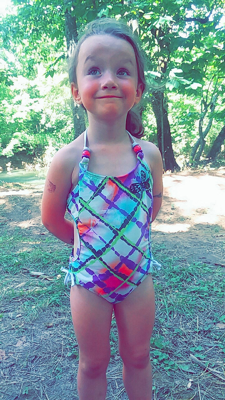 Braylynn is registered to the contest to win money with this photo: child, clothing, joy, leotard, maillot, one_piece_swimsuit, pattern, person, sportswear, summer, swimwear, toddler, vacation