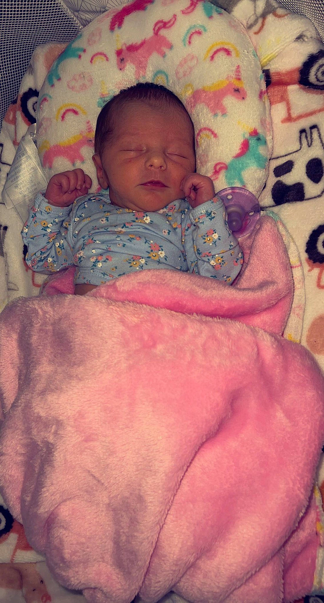 Marcella is registered to the contest to win money with this photo: baby, baby_toddler_clothing, cheek, child, chin, comfort, eye, face, head, human_body, iris, linens, lip, mouth, nose, organ, person, pink, skin, textile