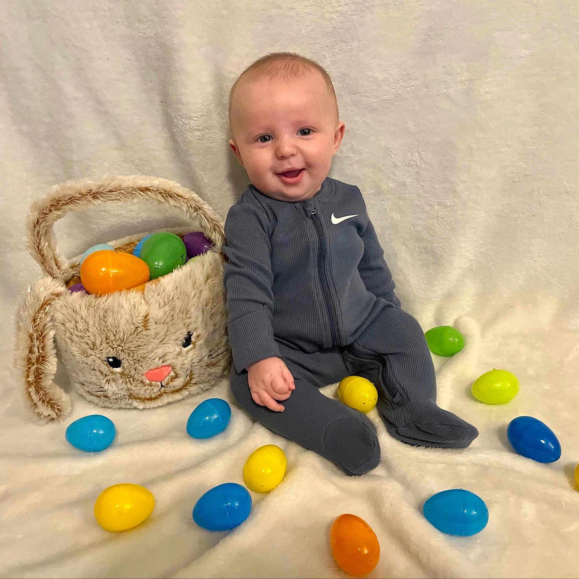 Creed is registered to the contest to win money with this photo: baby, babylaughing, blonde, clothing, crawling, face, hair, happy, head, pants, person, photography, portrait, rattle, sitting, sleeve, smile, standing, text, toy