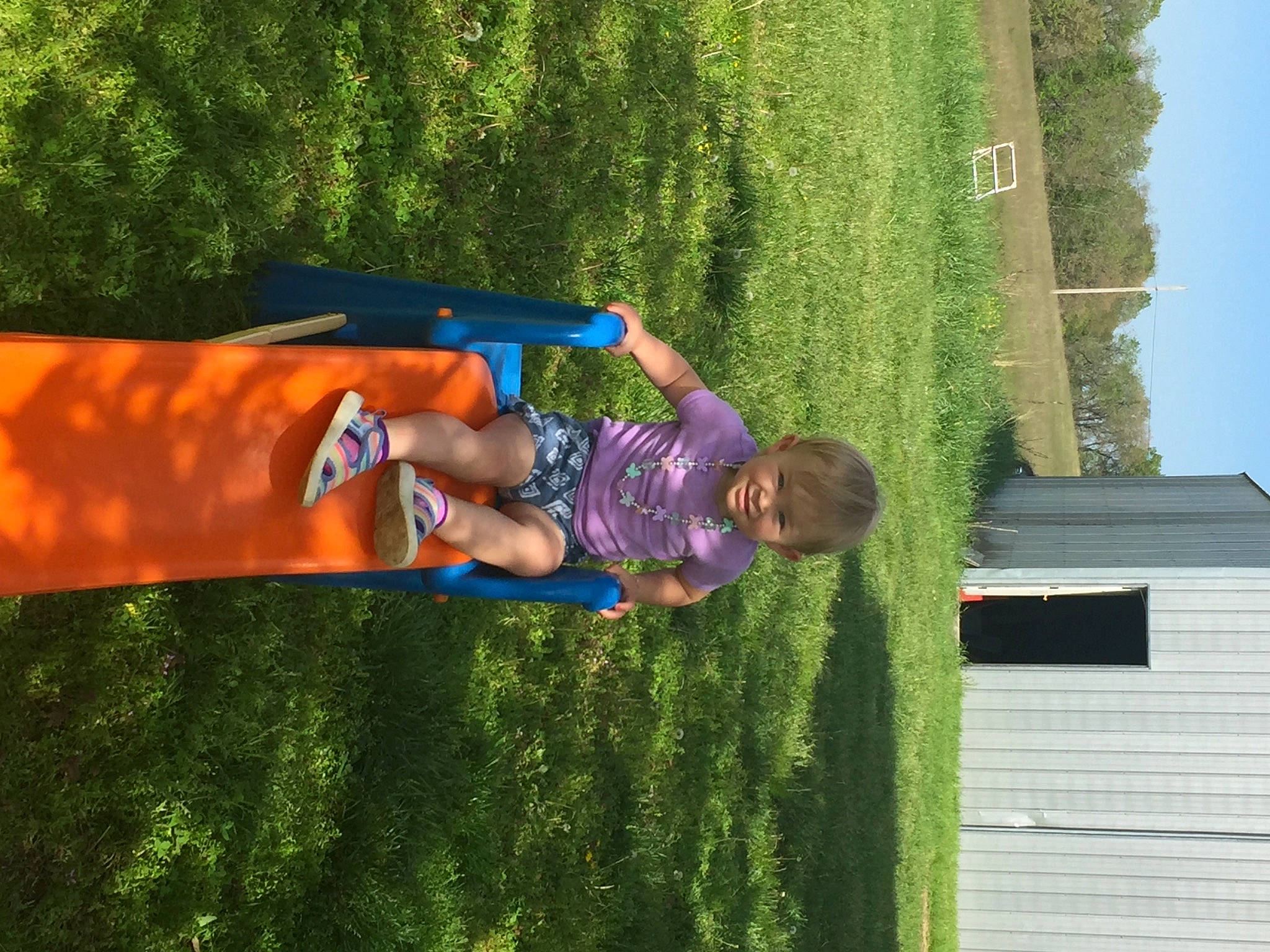 Alena joined the competition — help win amazing prizes! electric_blue, fun, grass, grassland, hand, happy, joy, landscape, lawn, leaf, leg, leisure, people_in_nature, person, plant, recreation, shrub, t_shirt, toddler, tree