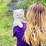 Lujain joined the competition — help win amazing prizes! animal, back_view, blonde_hair, cat, close_up, cute, expression, fluffy, fur, grass, holding, long_hair, nature, outdoor, person, pet, portrait, purple_shirt, shoulder, white_cat