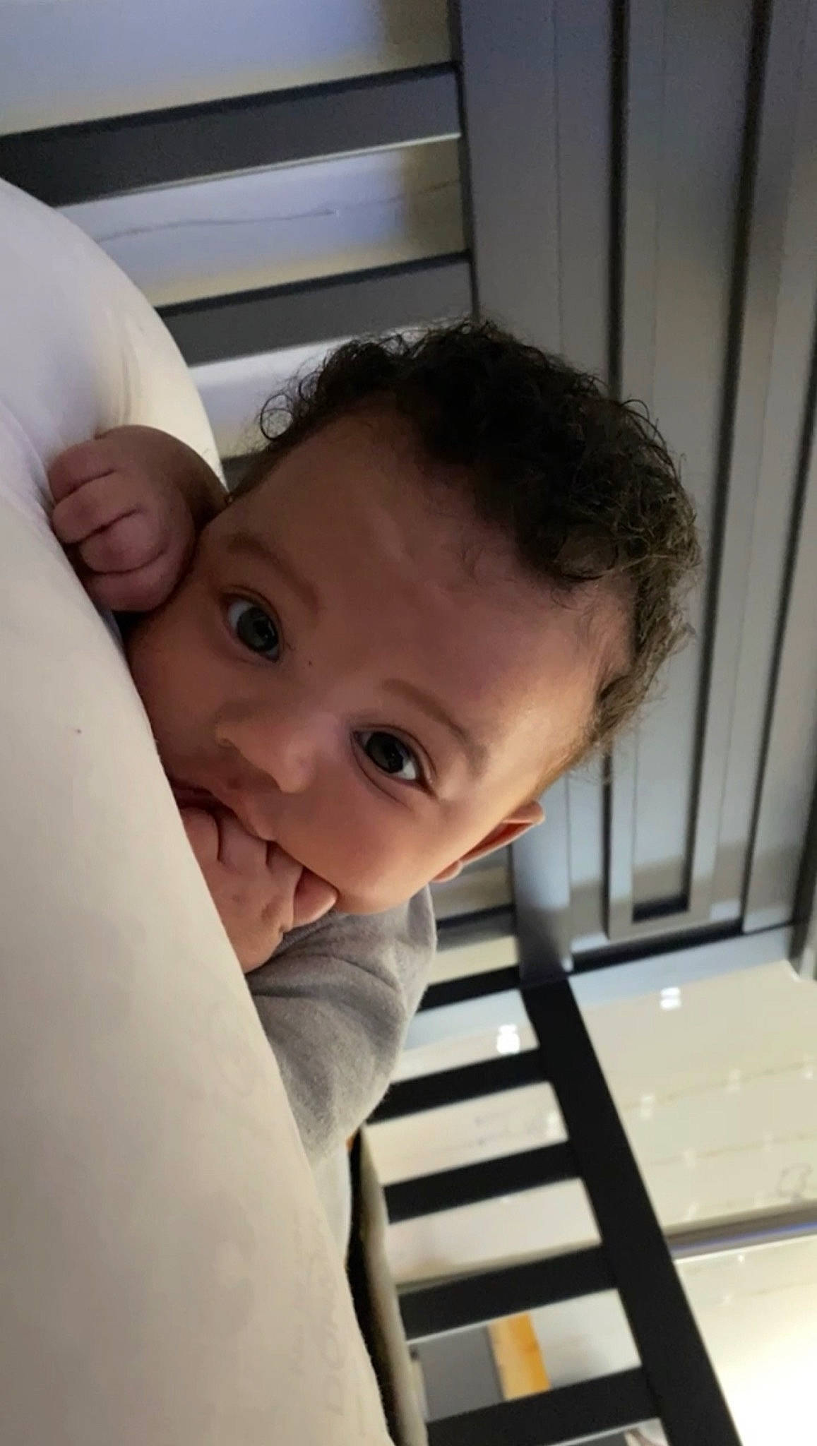 Kase joined the competition — help win amazing prizes! baby, black_hair, child, comfort, elbow, eye, eyebrow, eyelash, gesture, hairstyle, happy, head, mouth, nose, person, skin, smile, thumb, toddler, window