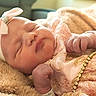 baby, newborn, sleeping, pink, bow, headband, bracelet, blanket, soft, cute, infant, closeup, peaceful, adorable, clothing, resting, hospital, tiny, portrait, child