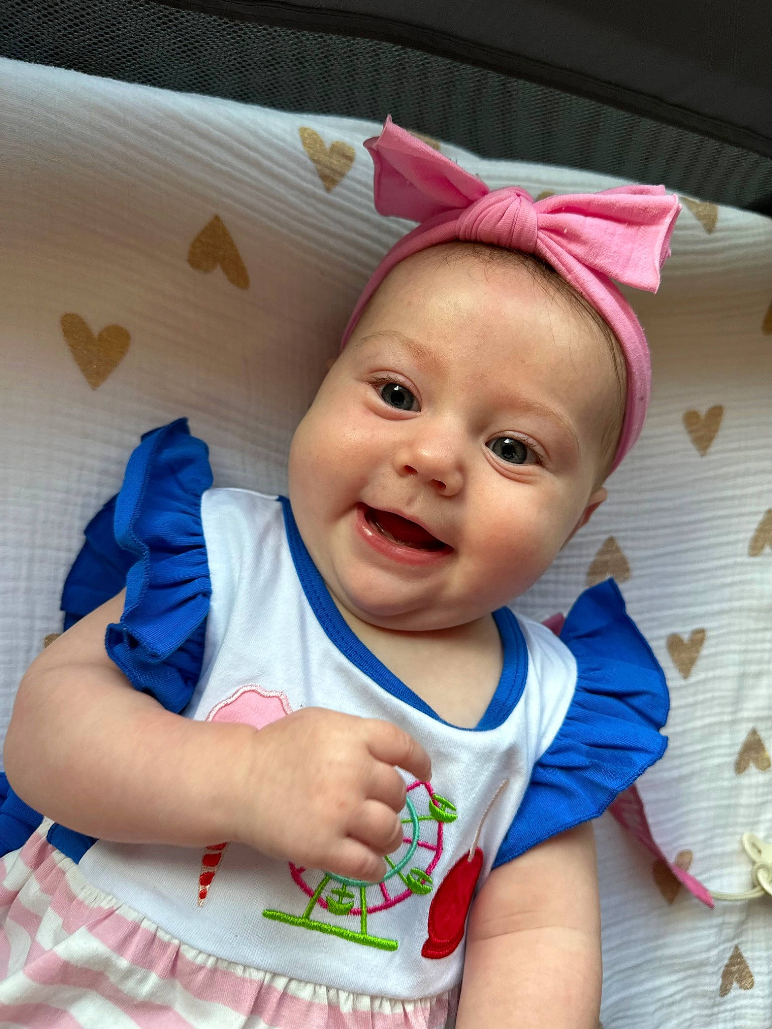 Lilly is registered to the contest to win money with this photo: baby, baby_laughing, baby_products, baby_toddler_clothing, cap, cheek, child, costume_hat, fashion_accessory, fun, happy, headgear, iris, joy, lip, person, pink, skin, sleeve, smile