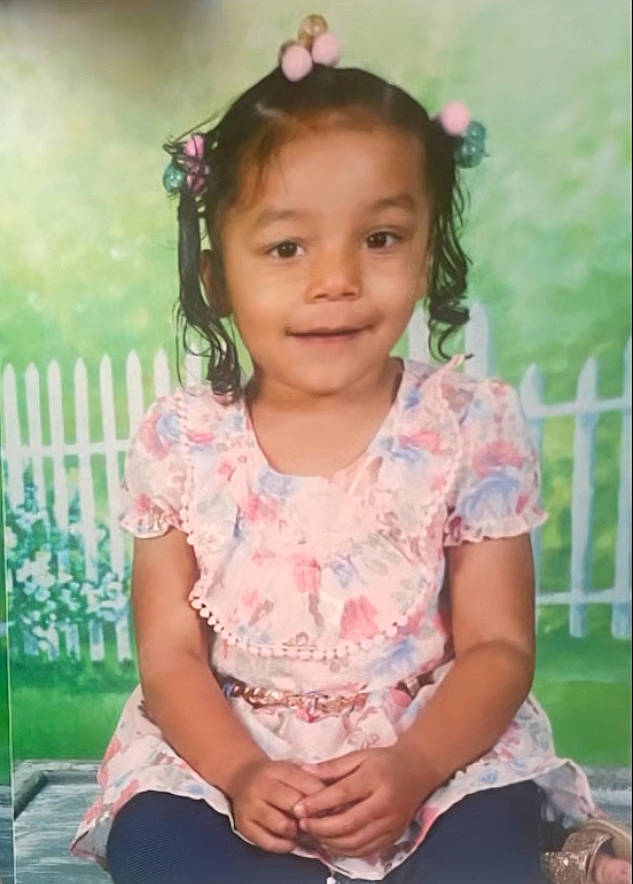 Nevaeh joined the competition — help win amazing prizes! baby_toddler_clothing, cheek, child, fun, grass, hair, happy, head, joy, leisure, magenta, neck, pattern, person, pink, plant, sitting, skin, sleeve, smile