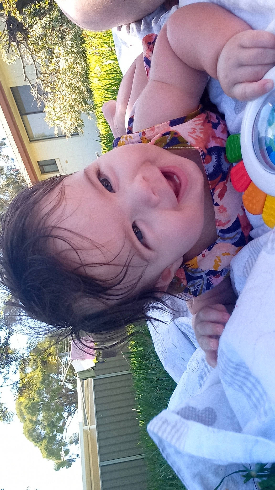 Alana is registered to the contest to win money with this photo: child, cool, facial_expression, fun, gesture, grass, green, hairstyle, happy, leisure, mouth, nose, person, plant, skin, smile, summer, toddler, tree, white