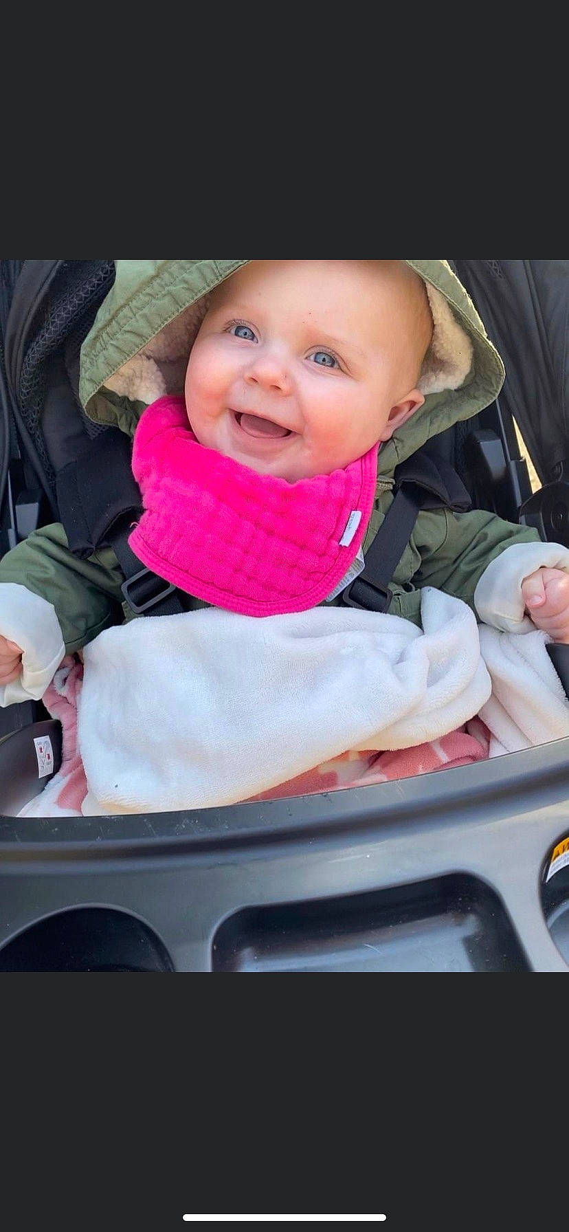 Grace is registered to the contest to win money with this photo: baby, baby_carriage, baby_in_car_seat, baby_safety, baby_toddler_clothing, beauty, black, car_seat, cheek, child, comfort, facial_expression, finger, happy, headwear, joy, person, photograph, pink, product