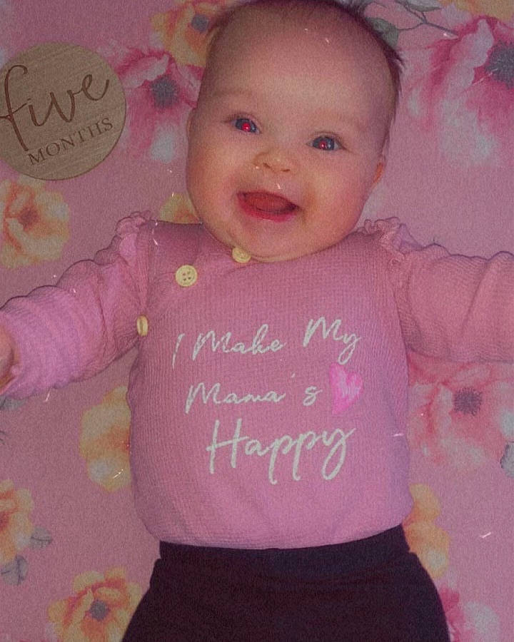 Harlee joined the competition — help win amazing prizes! baby, baby_toddler_clothing, cheek, child, eyebrow, handwriting, happy, iris, joy, lip, magenta, organ, person, pink, product, skin, sleeve, smile, t_shirt, textile