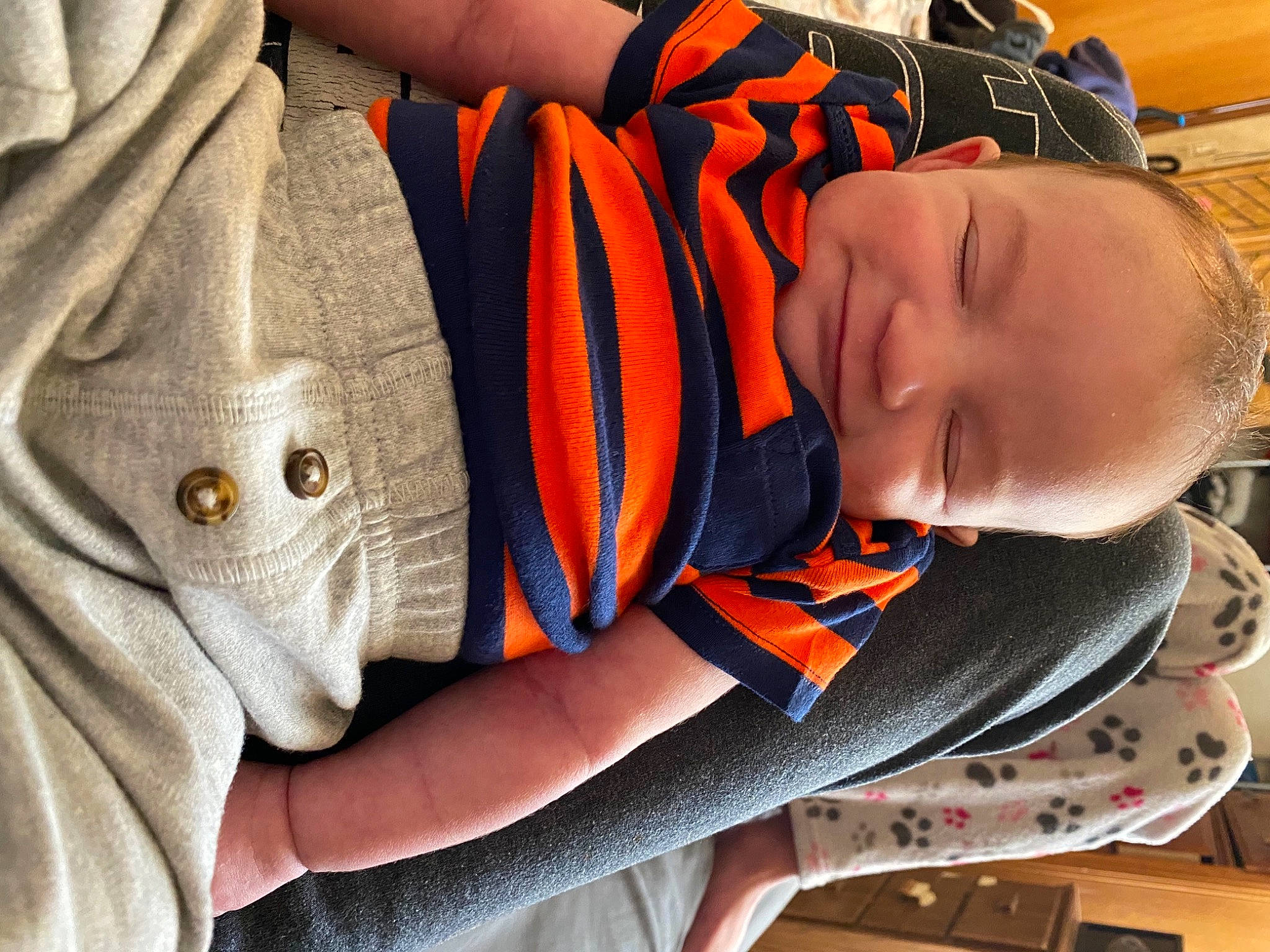 Jayce is registered to the contest to win money with this photo: baby, car_seat, carmine, chest, child, comfort, elbow, electric_blue, fun, lifejacket, mouth, nail, orange, pattern, person, personal_protective_equipment, plant, sitting, sleeve, sports_gear