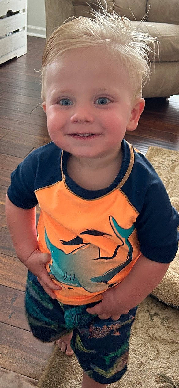 Jason is registered to the contest to win money with this photo: baby, baby_toddler_clothing, cheek, child, chin, forehead, happy, head, human_body, iris, joy, lip, mouth, neck, nose, person, plant, skin, sleeve, smile