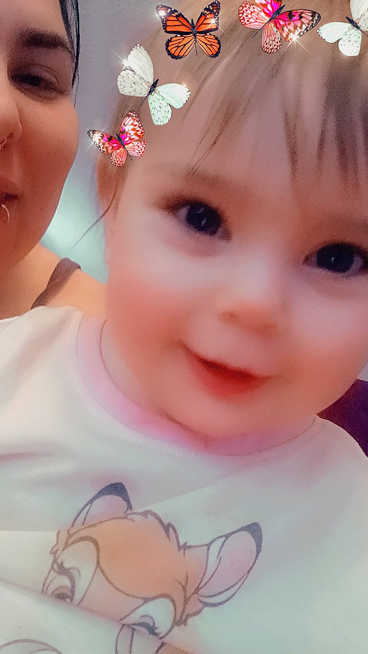 Amyah is registered to the contest to win money with this photo: black_hair, cheek, chin, cool, ear, eyebrow, eyelash, forehead, gesture, happy, headwear, iris, lip, neck, nose, organ, person, pink, skin, sleeve