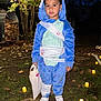 child, costume, blue, dinosaur, hoodie, bandages, bag, outdoor, night, candles, grass, tree, leaves, firewood, footwear, white_shoes, path, trick_or_treat, halloween, cute