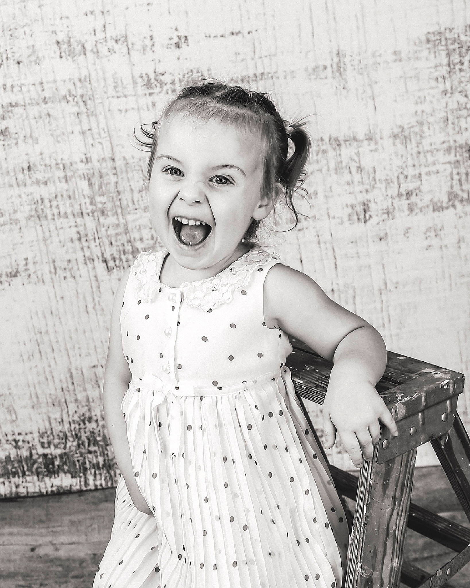 Annabeth joined the competition — help win amazing prizes! black_and_white, child, child_model, dress, facial_expression, joy, monochrome, monochrome_photography, pattern, people, person, photograph, photography, portrait, portrait_photography, retro_style, smile, snapshot, standing, stock_photography