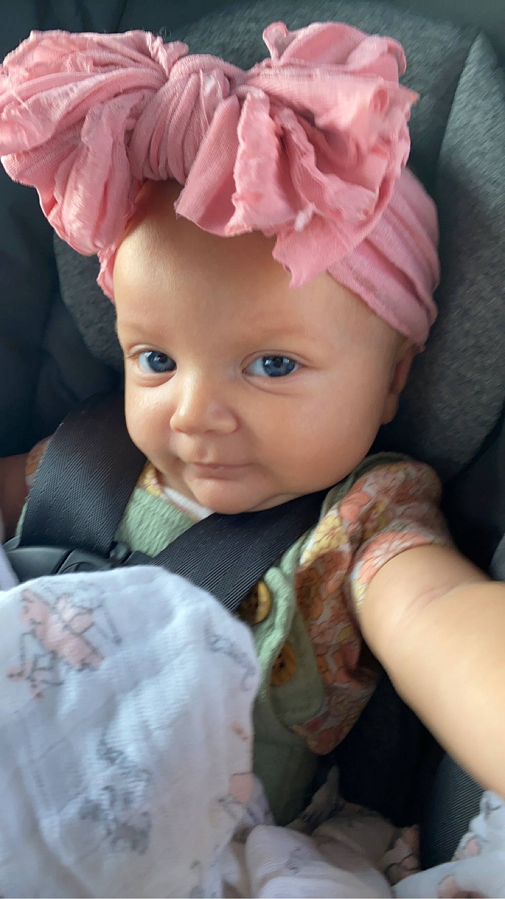 Josleigh is registered to the contest to win money with this photo: baby, baby_products, baby_toddler_clothing, cheek, child, comfort, dress, eye, fashion_accessory, happy, hat, head, headpiece, headwear, helmet, iris, lip, magenta, person, pink