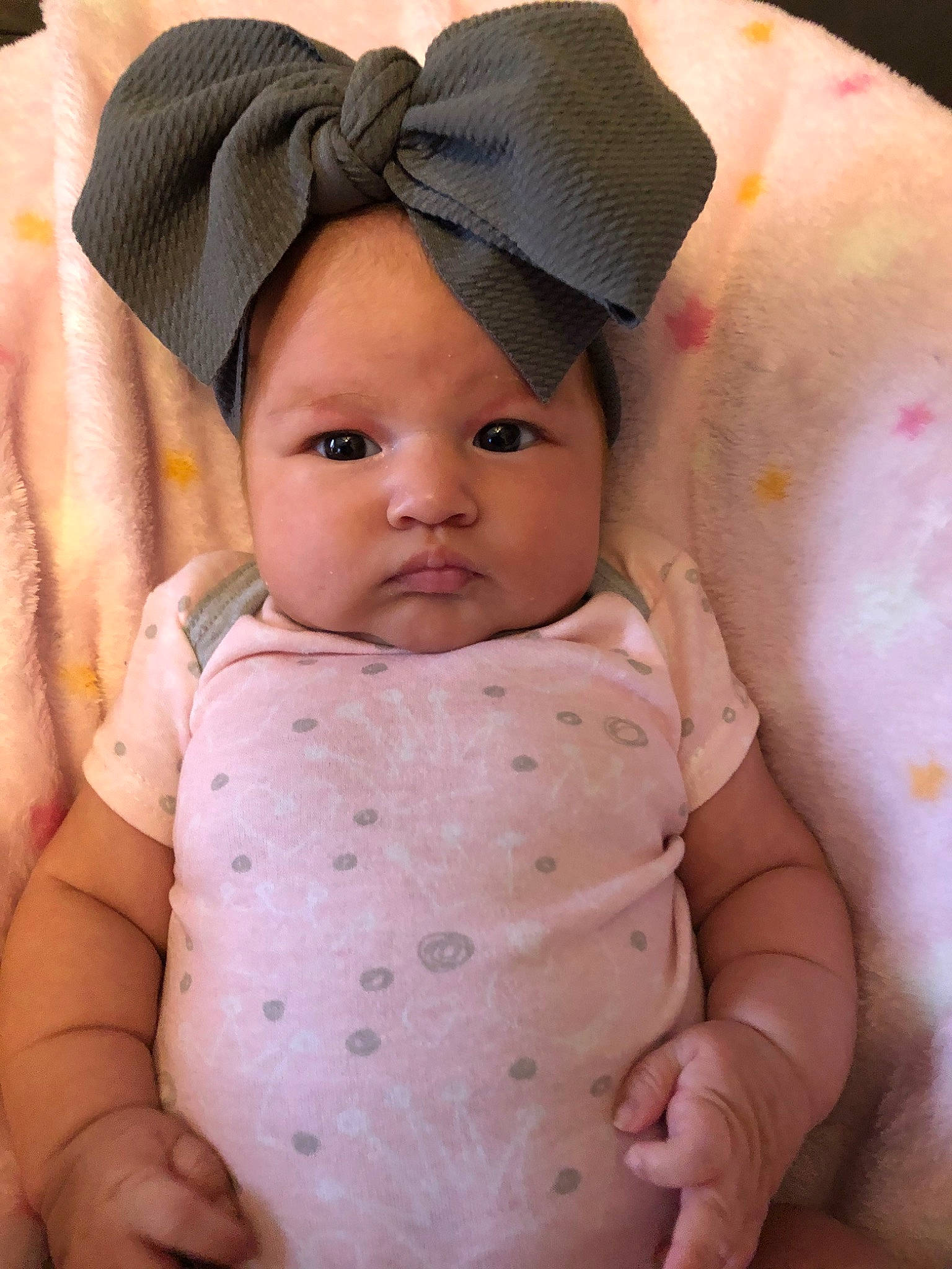 Amilia is registered to the contest to win money with this photo: baby, cheek, child, ear, face, fashion_accessory, hat, head, headgear, lip, person, pink, skin, toddler