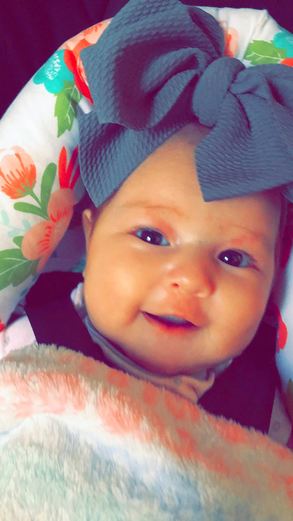 Amilia is registered to the contest to win money with this photo: baby, beauty, cheek, child, close_up, eye, eyebrow, face, forehead, hair_accessory, head, headgear, lip, nose, person, pink, skin, smile, toddler