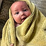 Marlee joined the competition — help win amazing prizes! baby, infant, child, towel, wrapped, eyes, blue_eyes, smile, mouth, hand, manicure, painted_nails, wooden_floor, hardwood_floor, closeup, portrait, adorable, skin, texture, cozy