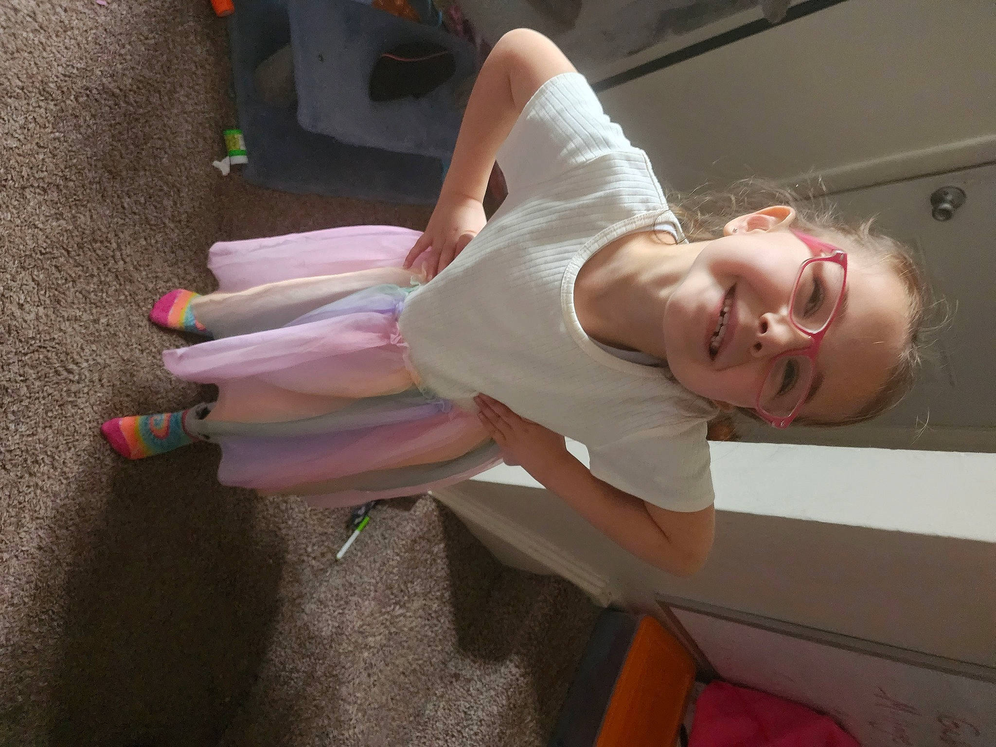 Gabrielle joined the competition — help win amazing prizes! abdomen, chest, child, comfort, elbow, flesh, floor, flooring, fun, happy, human_leg, joy, knee, magenta, person, room, sitting, smile, thigh, trunk