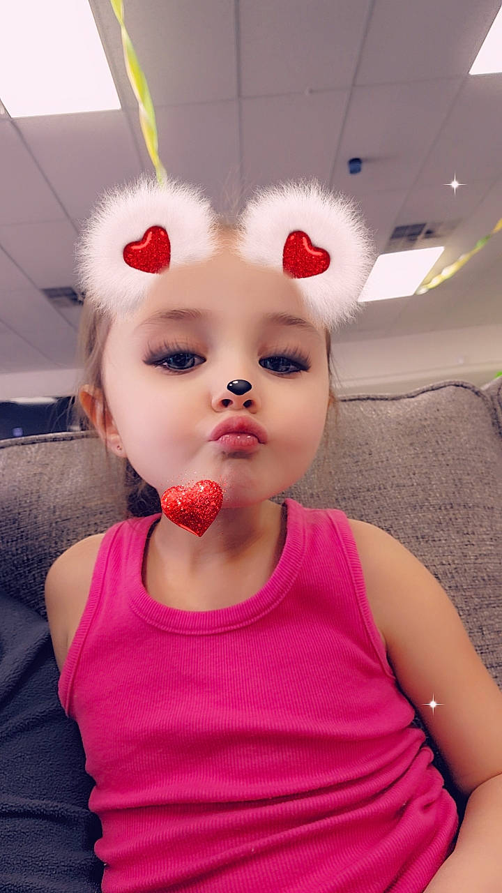Gabrielle joined the competition — help win amazing prizes! baby, baby_toddler_clothing, blond, cheek, child, dress, ear, eyelash, fun, fur, happy, lip, magenta, mouth, nose, party_supply, person, pink, skin, t_shirt