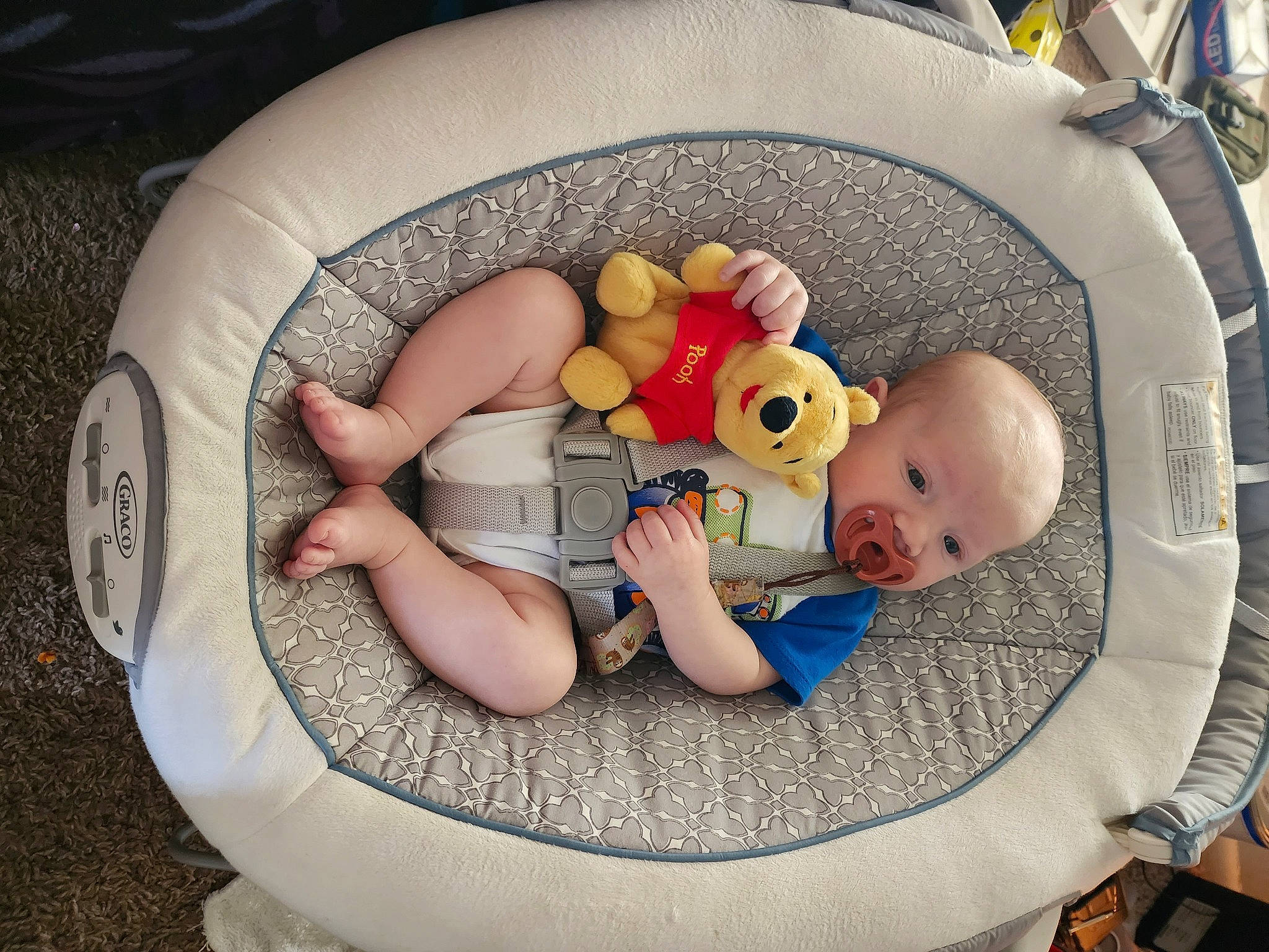 Christopher is registered to the contest to win money with this photo: baby, baby_carriage, baby_products, baby_safety, baby_sleeping, baby_toddler_clothing, baby_toys, bathing, chair, child, circle, comfort, infant_bed, lap, leisure, person, room, sitting, toddler, toy