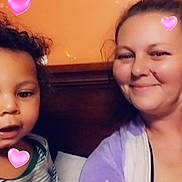 Ronald joined the competition — help win amazing prizes! child, woman, smiling, selfie, hearts, curly_hair, bedroom, orange_wall, purple_clothing, striped_shirt, digital_hearts, family, indoor, happy, casual, people, head_and_shoulders, affection, love, portrait