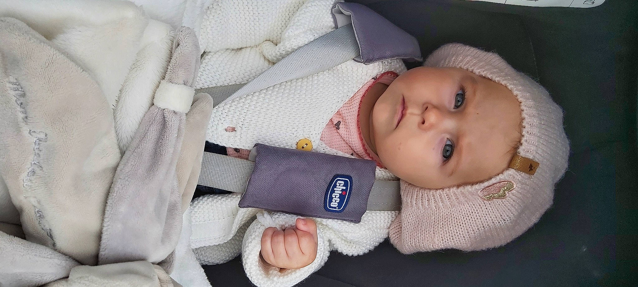 Kallie participe au concours pour gagner de l'argent avec cette photo : baby, baby_carriage, baby_products, baby_sleeping, baby_toddler_clothing, cheek, child, comfort, gesture, hand, headgear, headwear, linens, lip, nose, outerwear, person, product, skin, sleeve