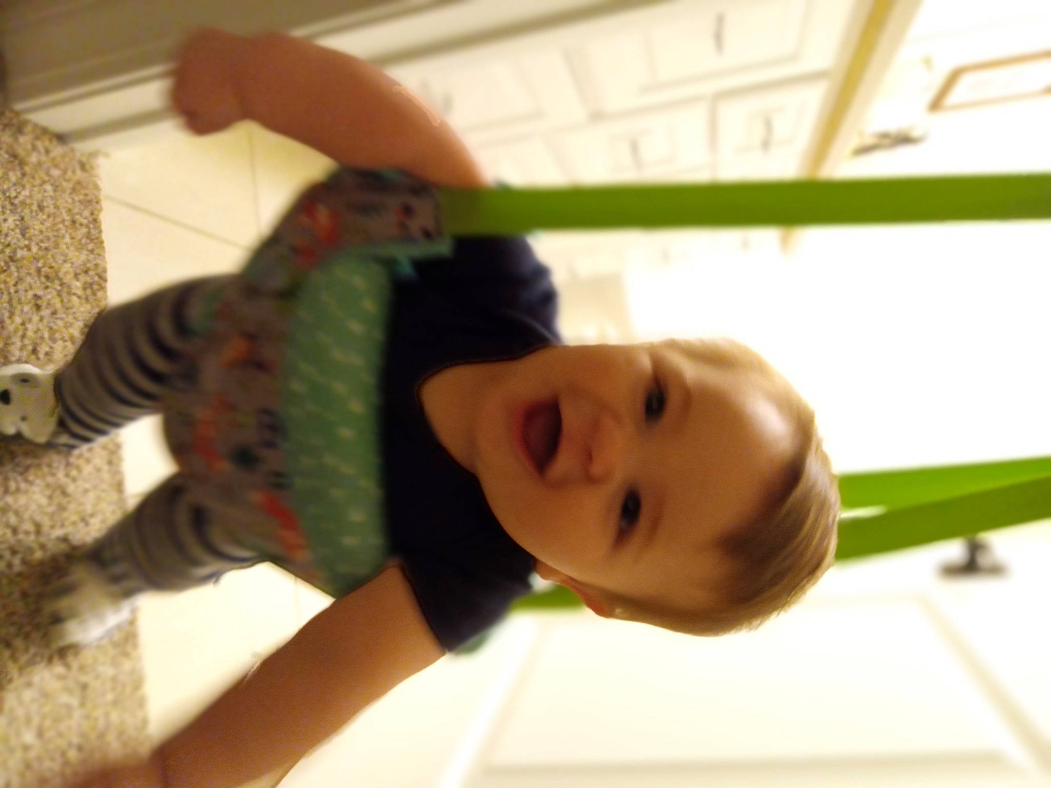 Bentley is registered to the contest to win money with this photo: baby, ceiling, cheek, child, elbow, finger, flooring, fun, happy, leisure, nose, pattern, person, play, room, skin, smile, thumb, toddler, wood