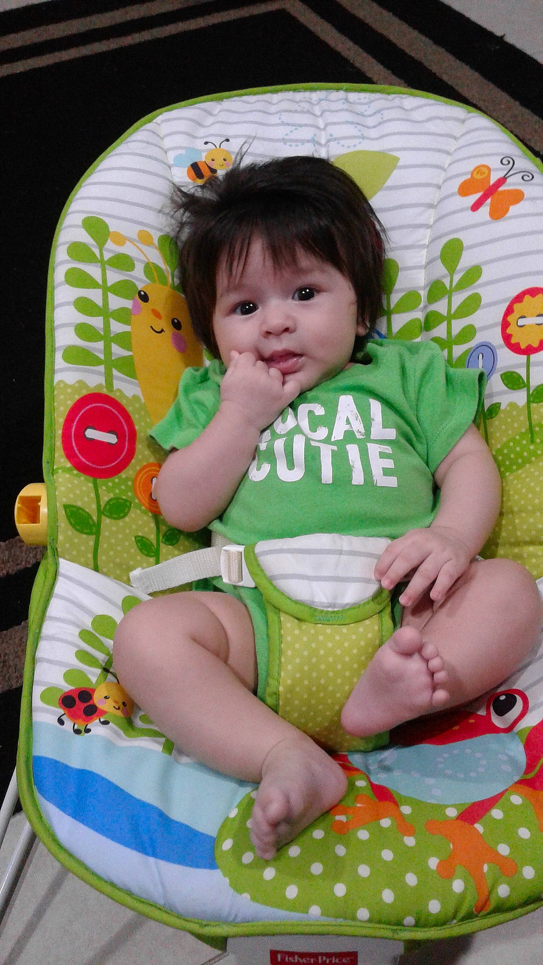 Jariel is registered to the contest to win money with this photo: baby_products, child, day, fun, girl, green, infant, person, play, product, sitting, skin, smile, toddler, toy
