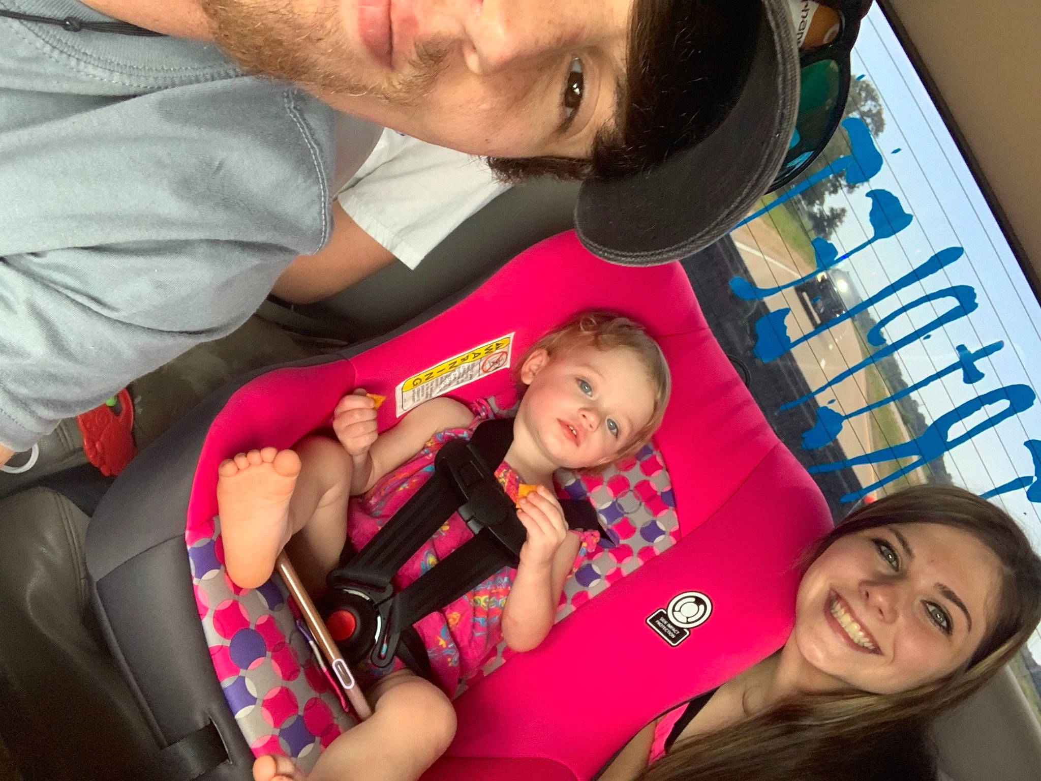 Saylor joined the competition — help win amazing prizes! comfort, eye, face, facial_expression, finger, fun, gesture, happy, human, joy, lap, leisure, mouth, organ, people, person, pink, product, red, skin