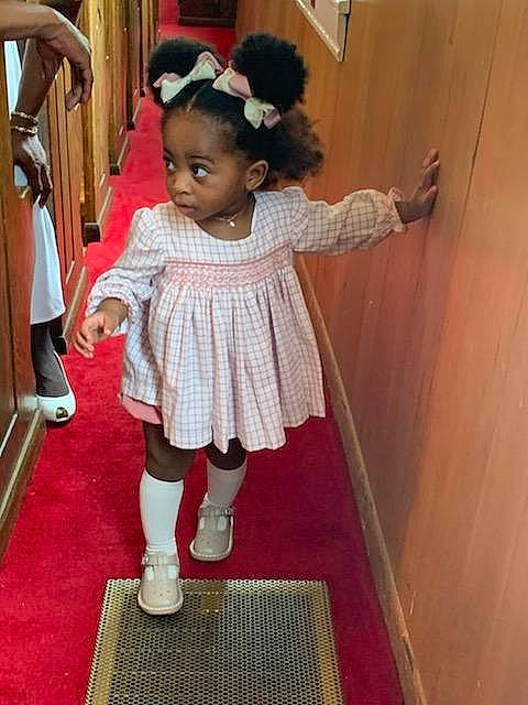 Kyomi joined the competition — help win amazing prizes! baby_toddler_clothing, carpet, child, costume, door, event, fashion_design, flooring, formal_wear, fun, happy, human_leg, knee, person, room, sandal, sock, thigh, toddler, tradition