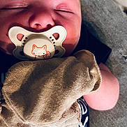 James joined the competition — help win amazing prizes! accessories, baby, blanket, bodypart, clothing, cushion, face, finger, glove, hand, hat, head, homedecor, newborn, person, photography, portrait, sleeping, t_shirt, towel