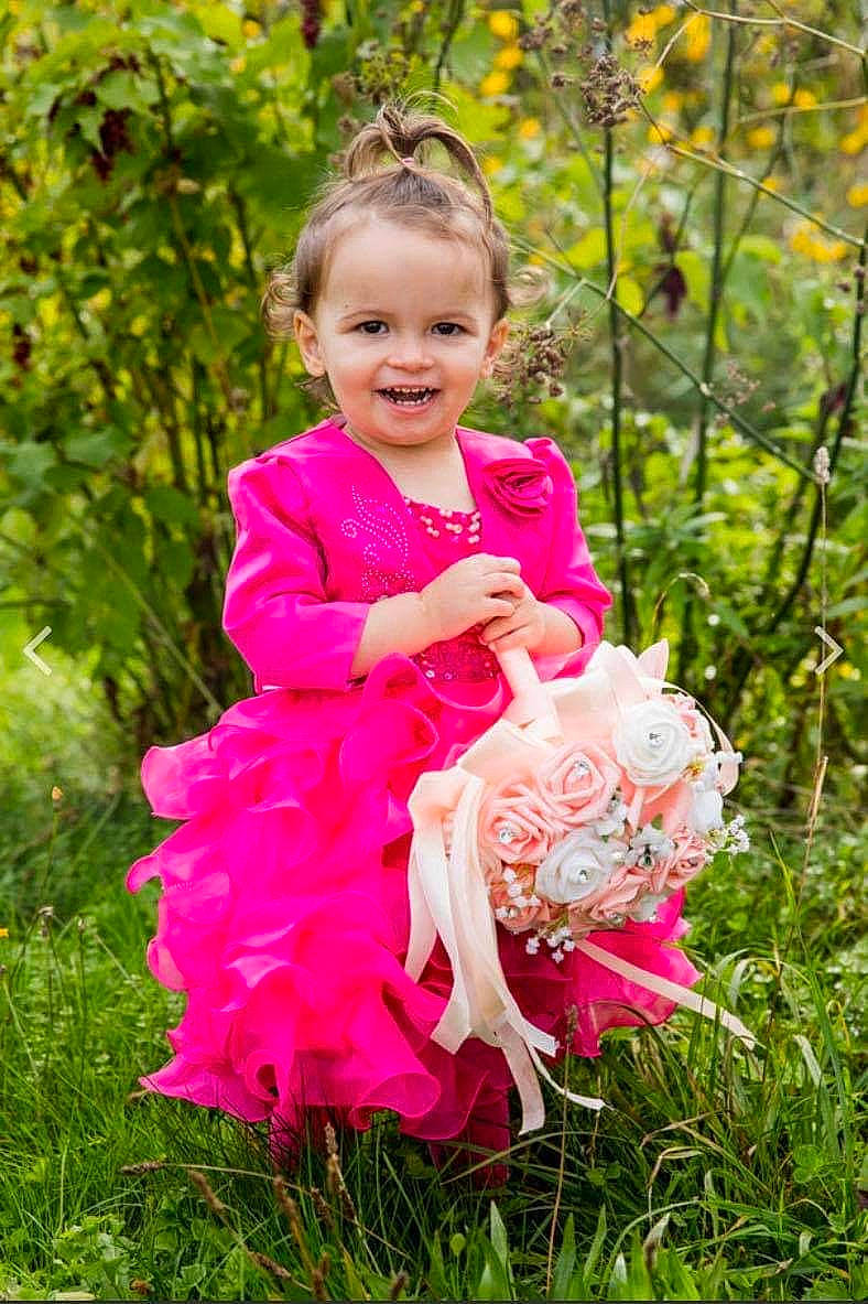 Shaynna participe au concours pour gagner de l'argent avec cette photo : baby, baby_toddler_clothing, child, child_model, day_dress, dress, embellishment, fashion_accessory, garden, hair_accessory, happy, joy, magenta, peach, people_in_nature, person, petal, pink, portrait_photography, spring