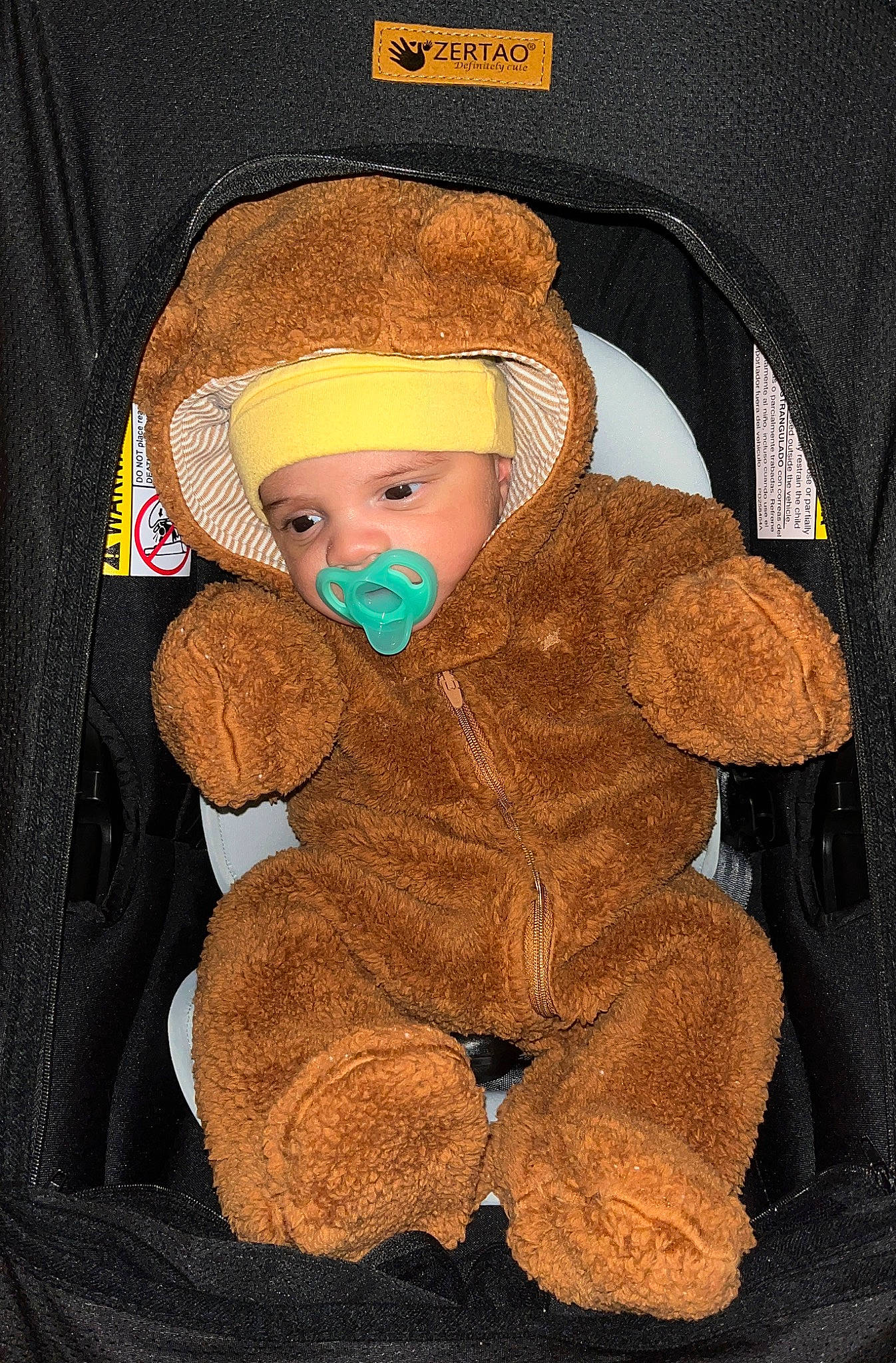 Akio joined the competition — help win amazing prizes! baby, baby_carriage, baby_products, baby_safety, baby_sleeping, baby_toddler_clothing, beanie, brown, cap, car_seat, cheek, child, comfort, headgear, headwear, knit_cap, person, personal_protective_equipment, sleeve, stuffed_toy