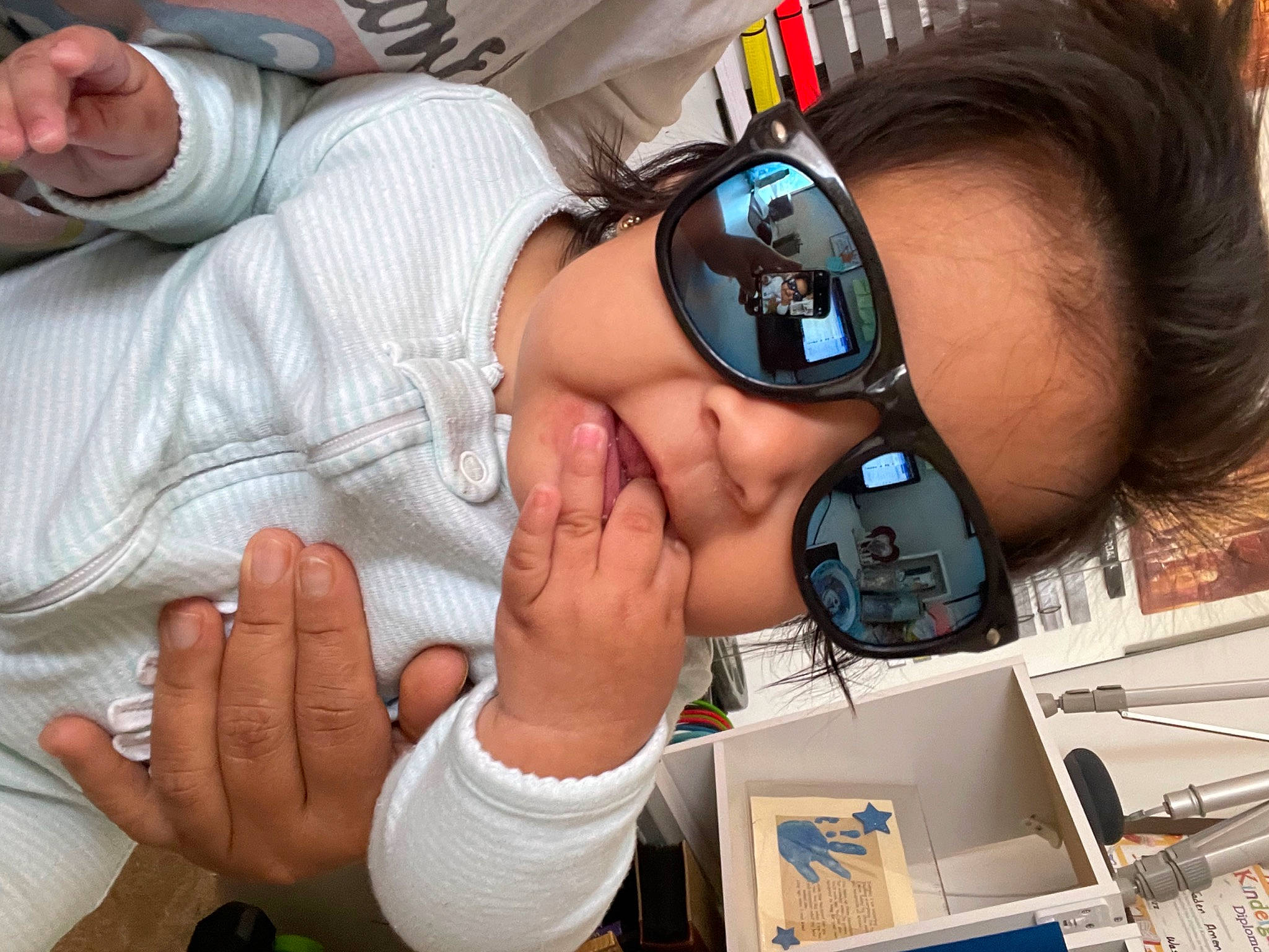 Jamie joined the competition — help win amazing prizes! audio_equipment, black_hair, cameras_optics, ear, eyelash, eyewear, finger, fun, gadget, gesture, hand, happy, hearing, mouth, nail, person, personal_protective_equipment, sunglasses, thumb, vision_care