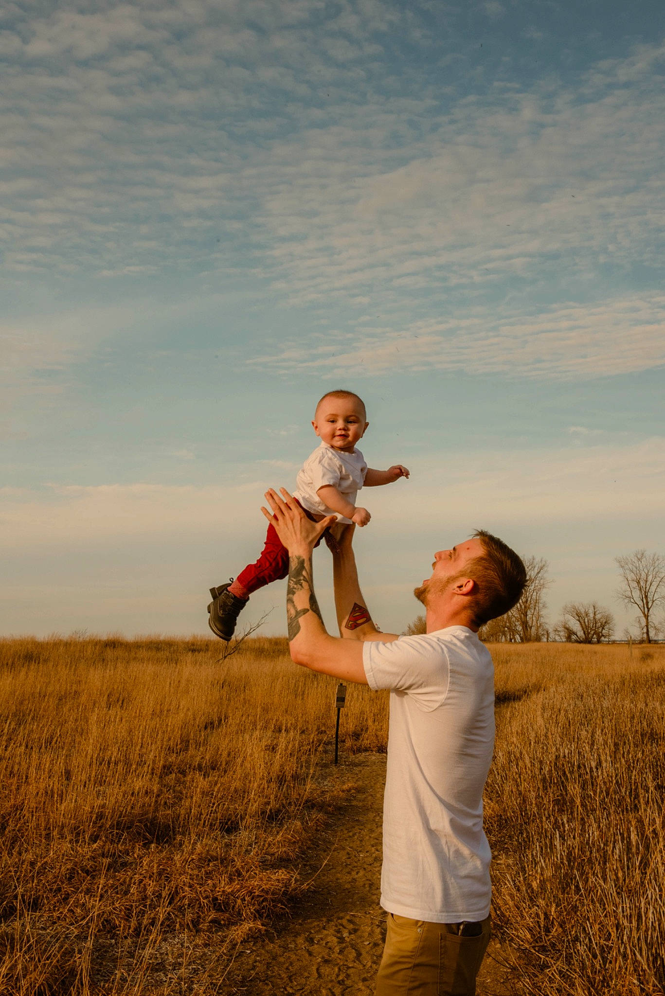 Milo joined the competition — help win amazing prizes! agriculture, cloud, field, flash_photography, fun, gesture, grass, grass_family, grassland, happy, landscape, leisure, meadow, natural_landscape, people_in_nature, person, plain, plant, prairie, sky