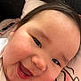 Yurie joined the competition — help win amazing prizes! baby, close_up, smiling, face, cheeks, eyes, joyful, infant, child, blanket, soft, happy, cute, skin, mouth, expression, young, lying_down, indoors, person