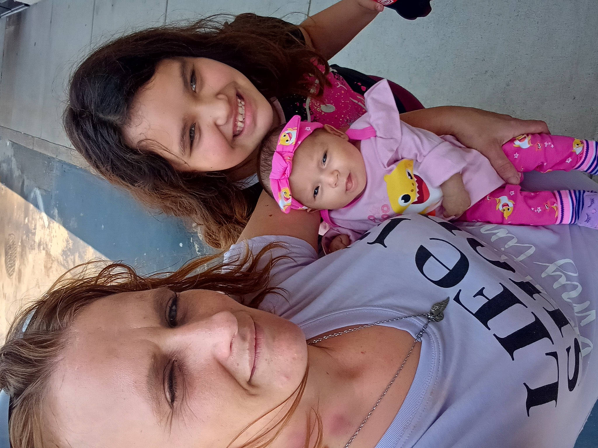 Grace is registered to the contest to win money with this photo: baby_toddler_clothing, cheek, comfort, eye, face, facial_expression, fun, happy, headwear, human, joy, leisure, lip, mouth, nose, organ, people, person, photograph, pink